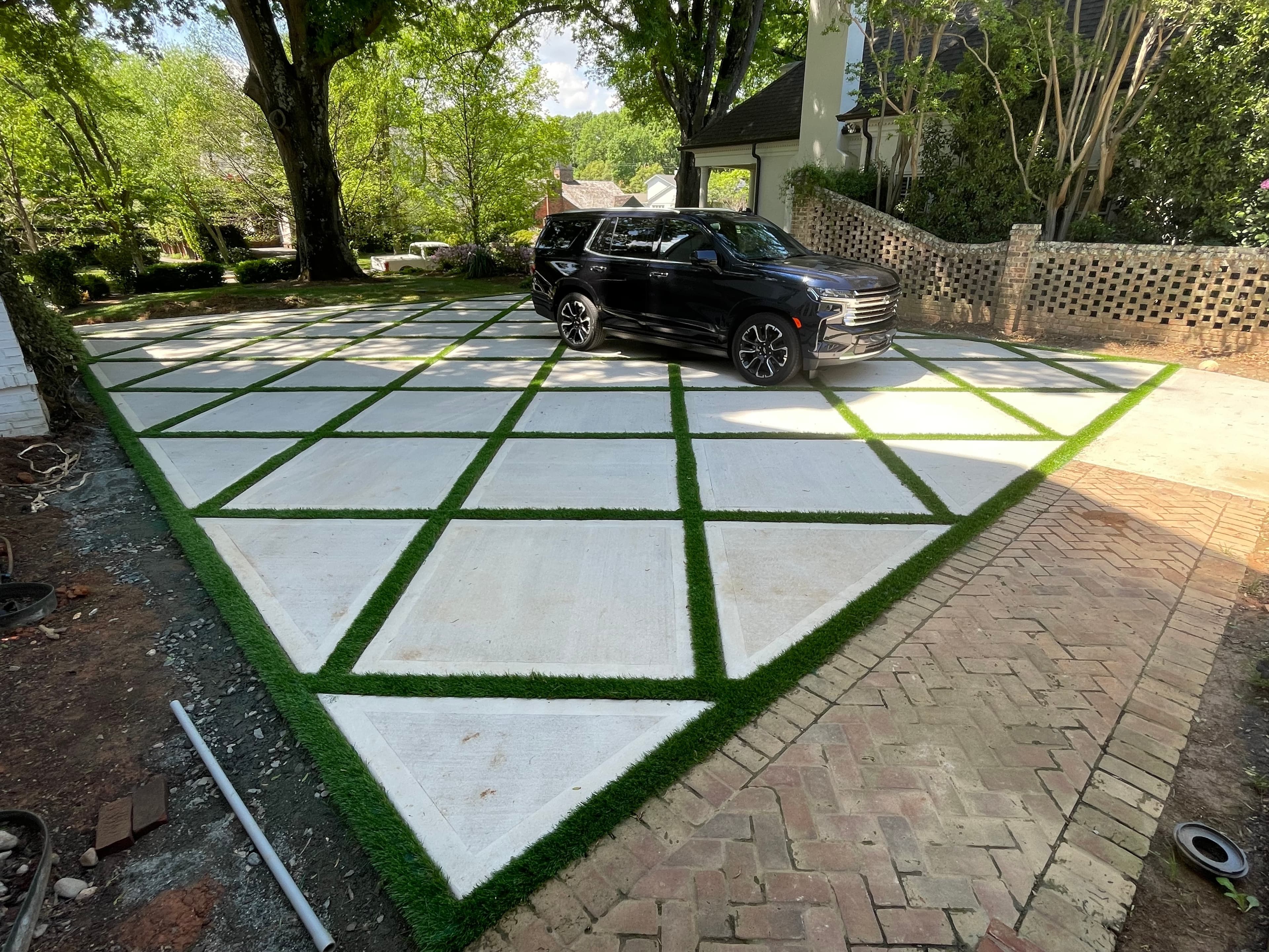 Modern turf installation with concrete