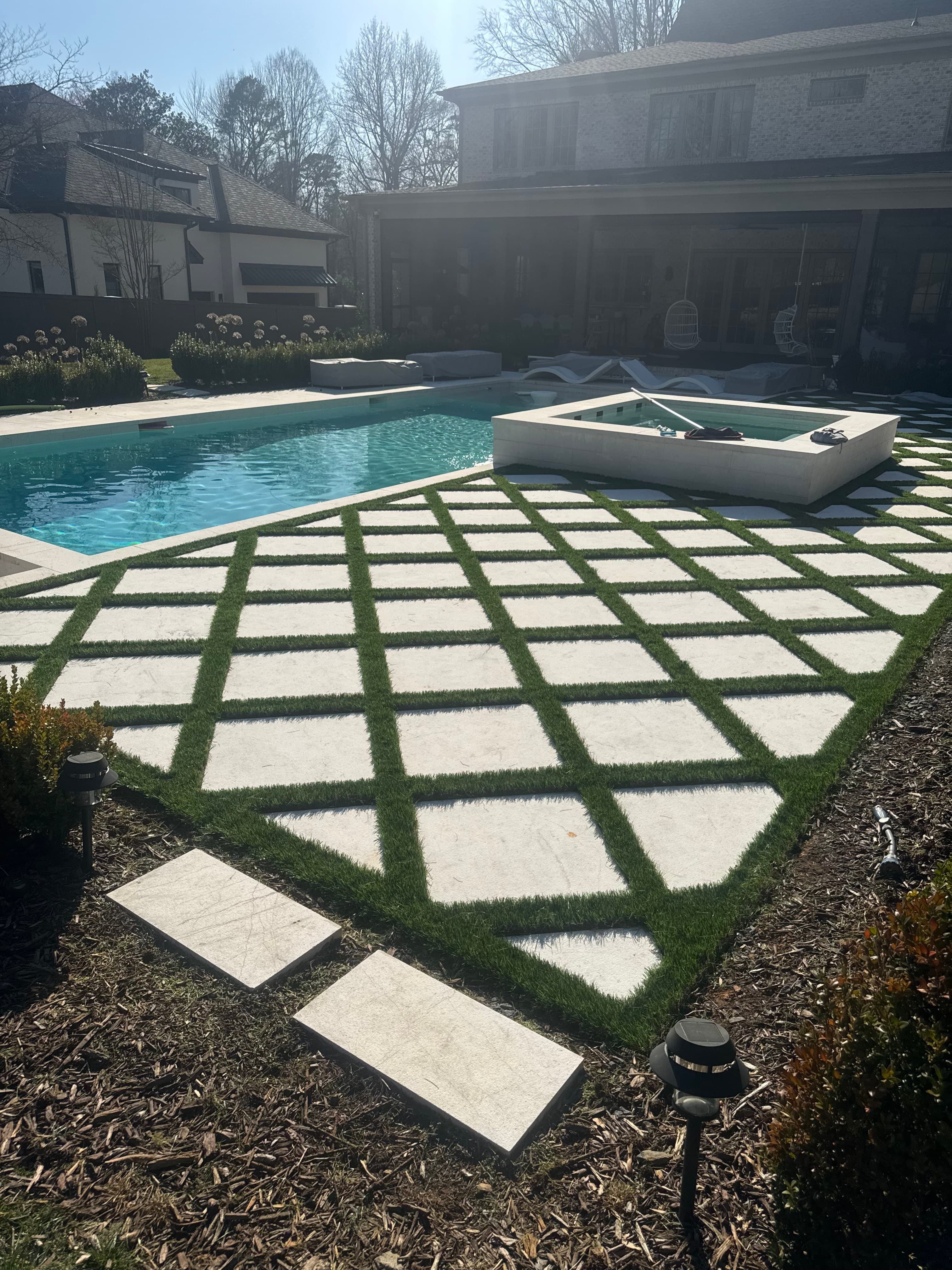 Pool area with artificial turf