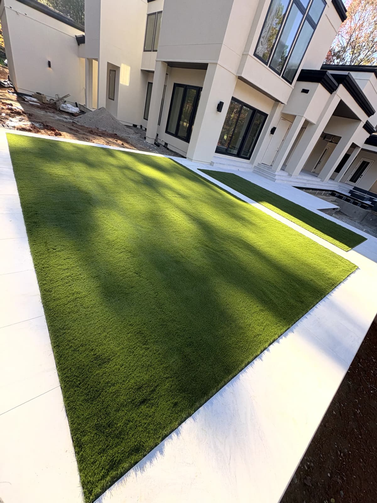 Modern New Construction — Courtyard Turf Panels