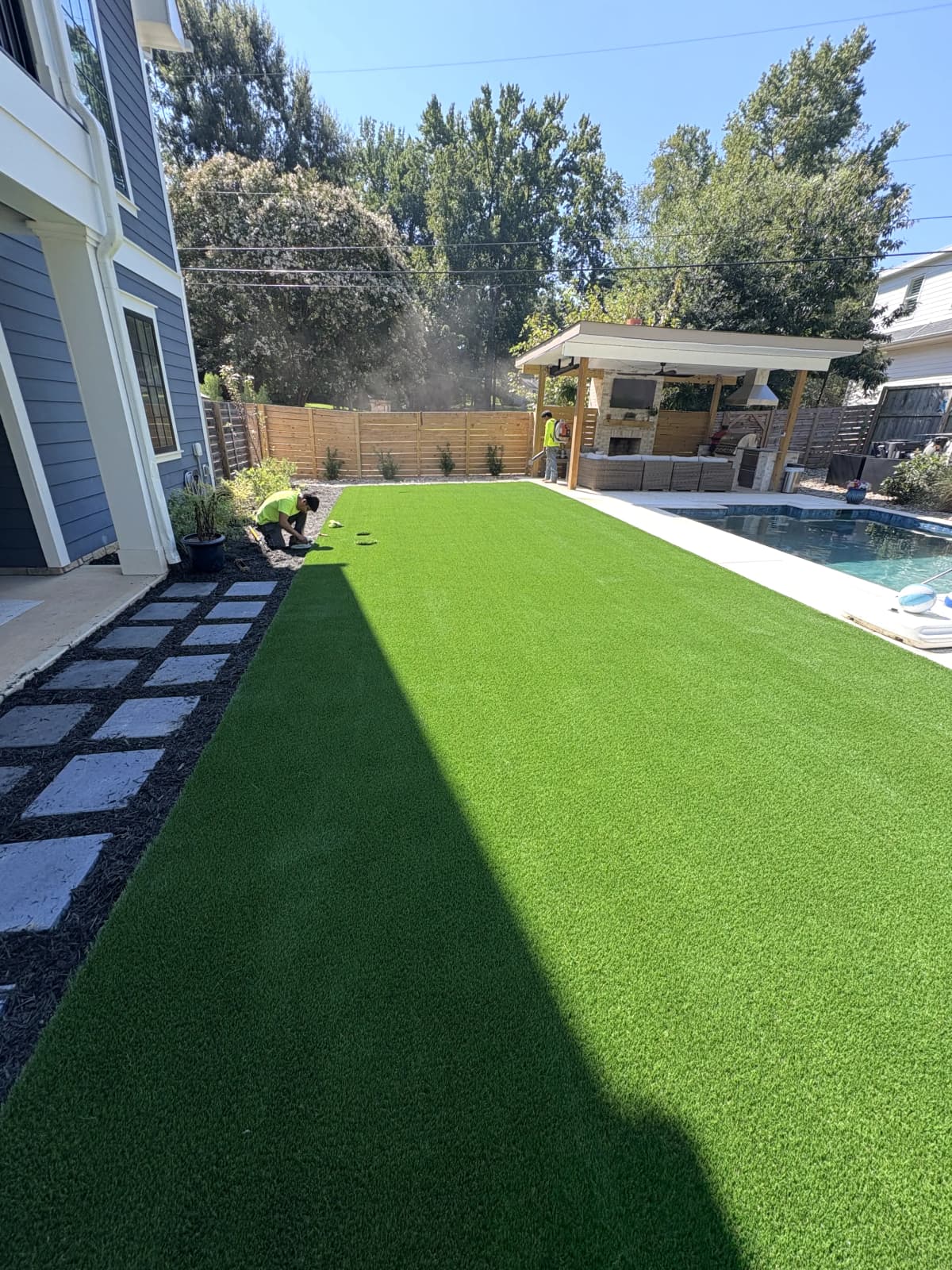 Backyard Pool Turf with Outdoor Kitchen Pavilion