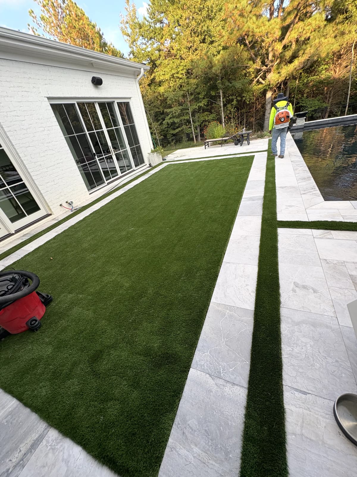 Luxury Pool Surround — Turf & Marble Pavers