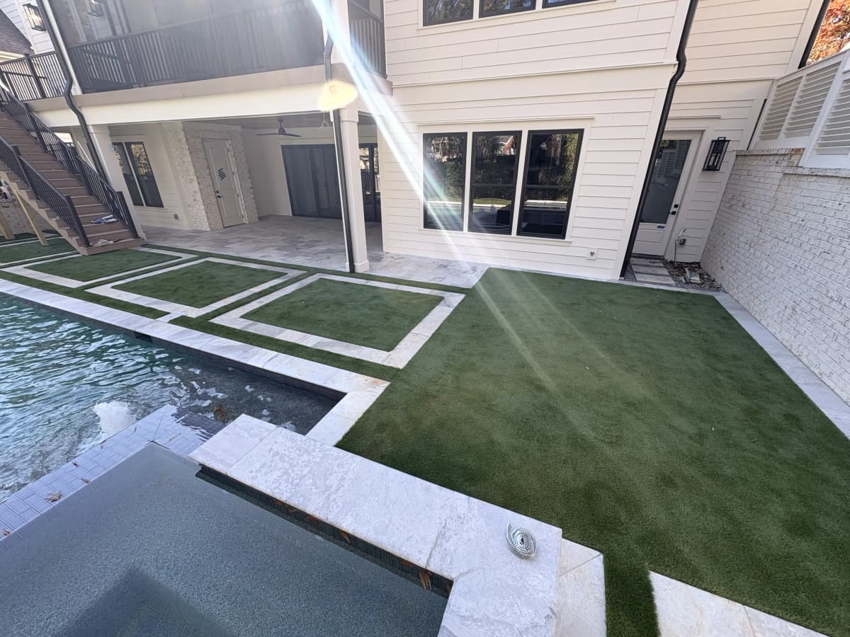 Luxury Pool — Geometric Turf Grid Ground View