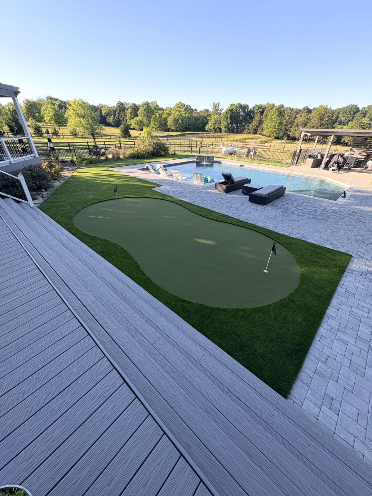 Putting Green & Pool Deck — Farmhouse Backyard