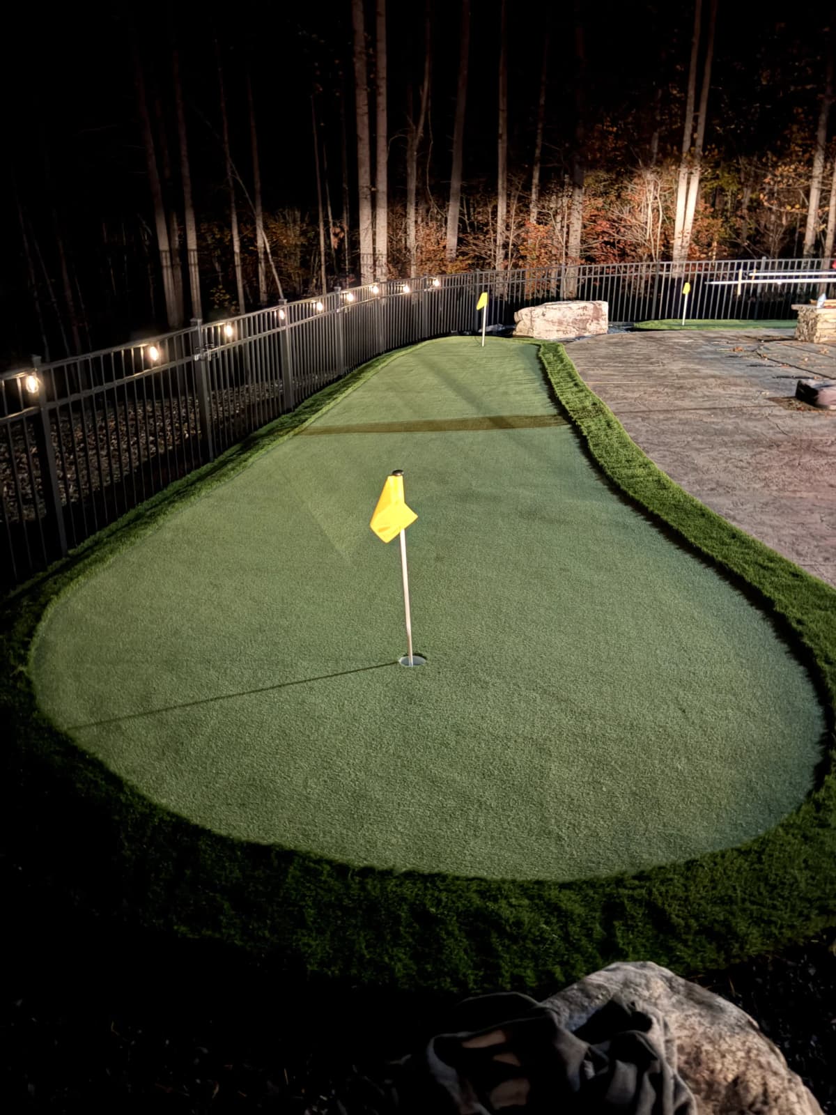 Putting Green — Night Lit, Iron Fence & Fire Pit