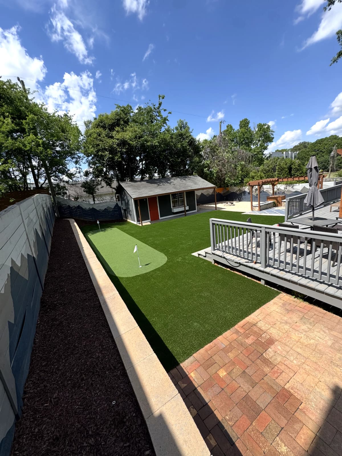 Putting Green & Lawn — Urban Backyard with Deck