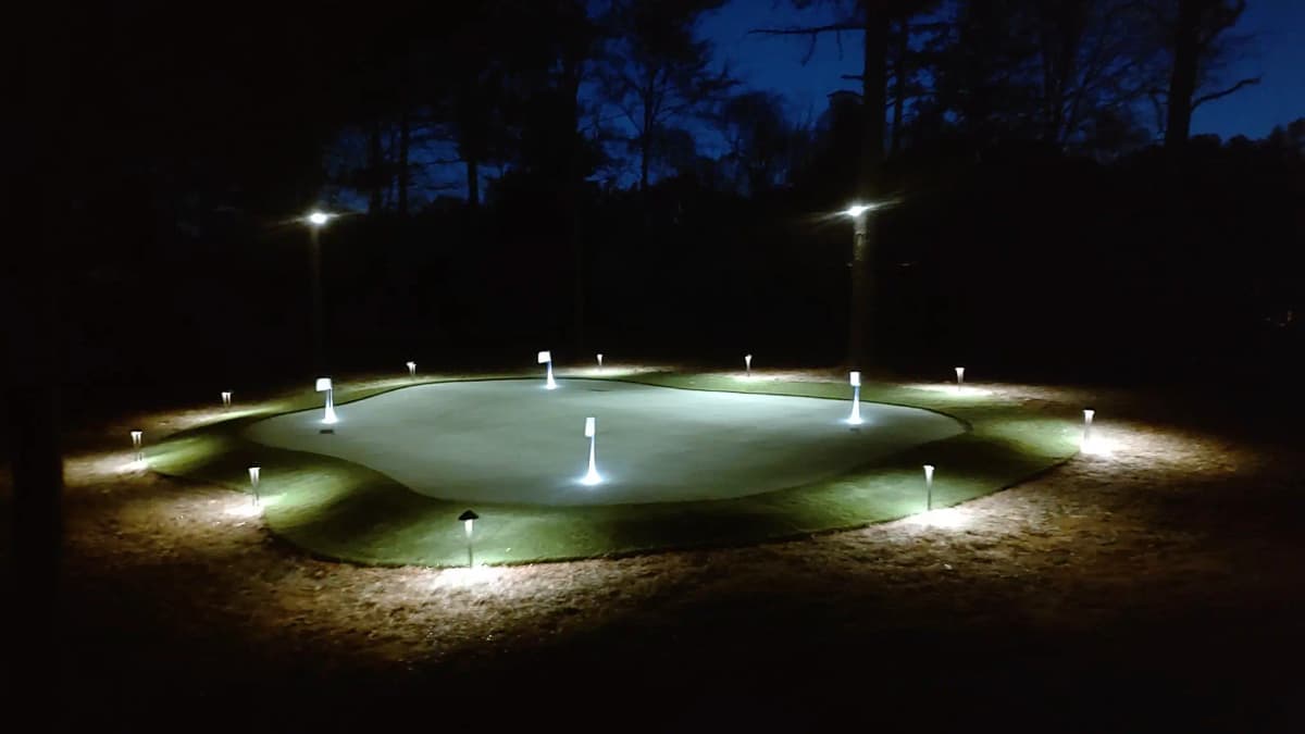 Multi-Hole Putting Green — Night-Lit Estate