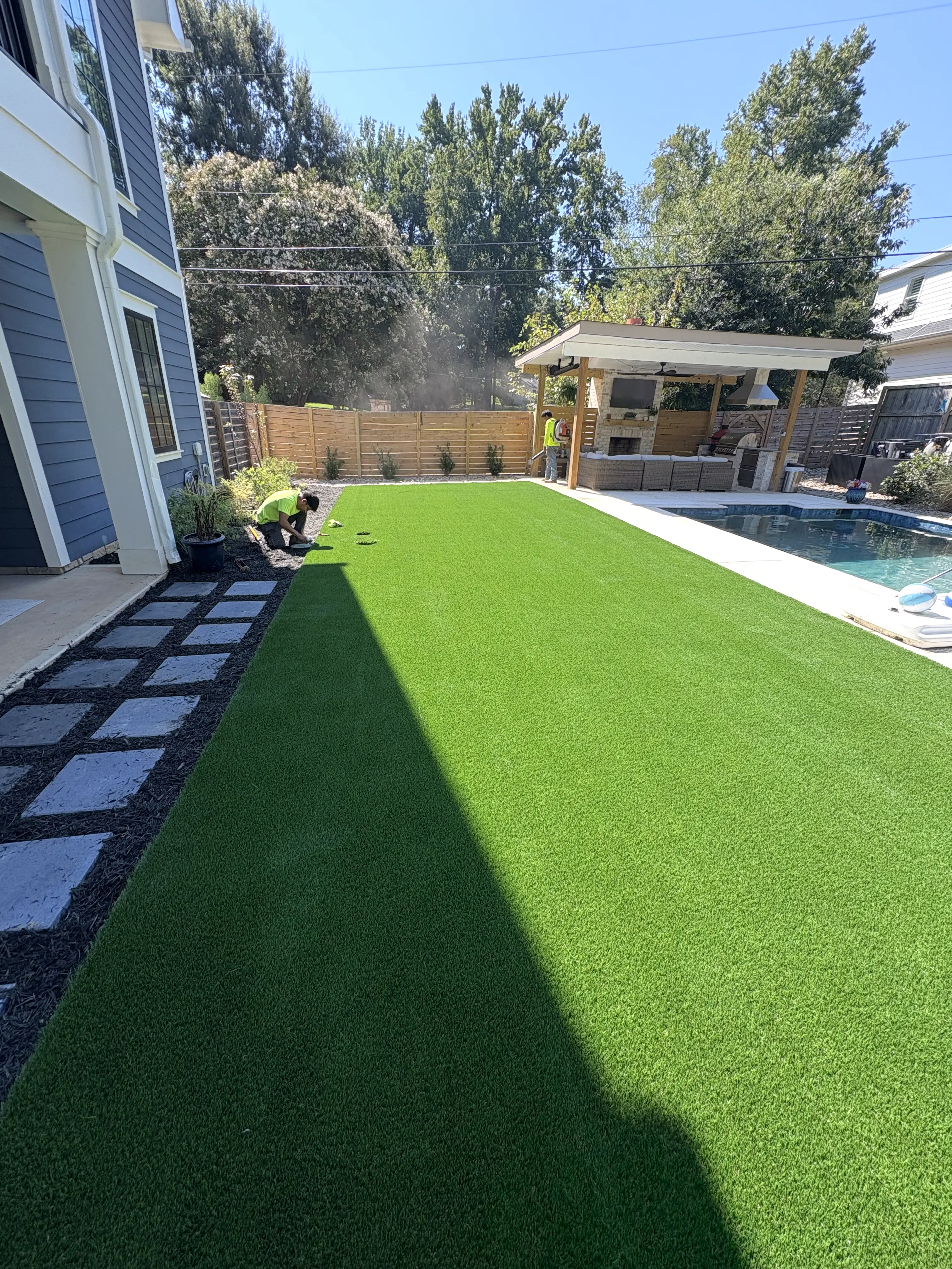 Backyard Pool Turf with Outdoor Kitchen Pavilion