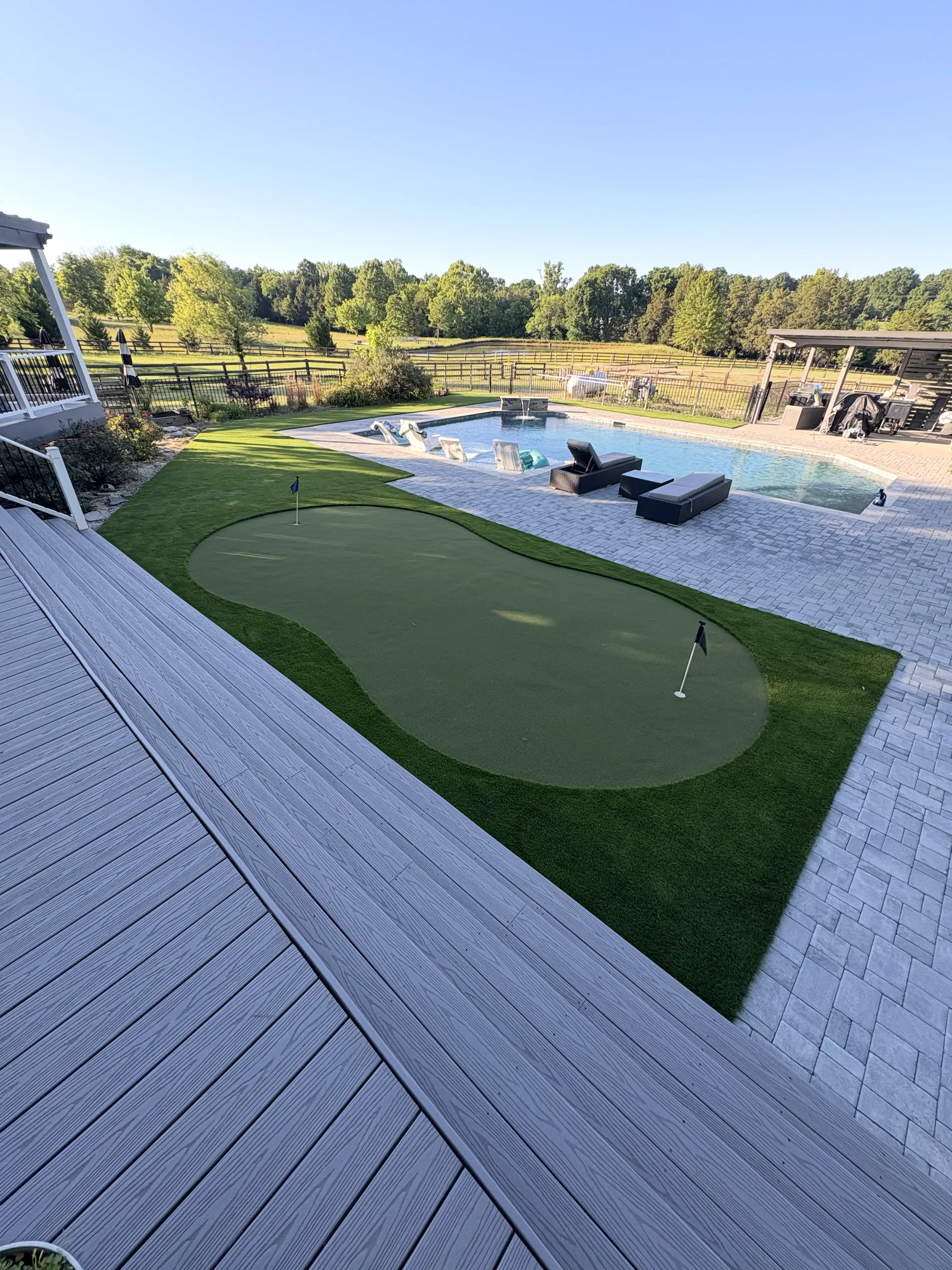Putting Green & Pool Deck — Farmhouse Backyard